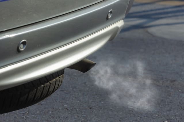 5 Causes of White Smoke from Exhaust and How to Fix 1 1 Silver Car with Black Exhaust Pipe