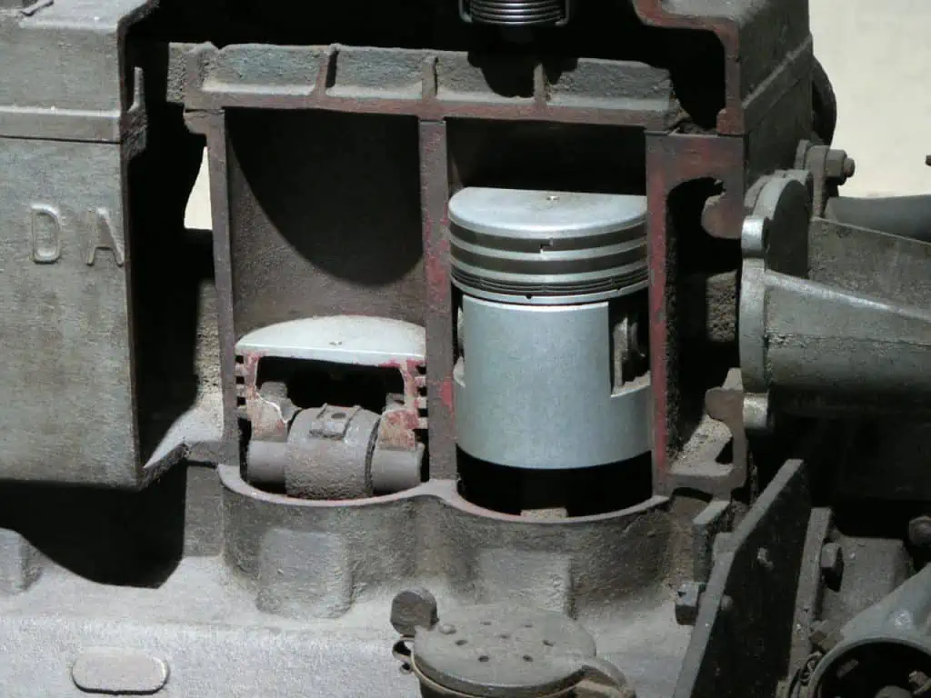 1. Pistons within a sectioned petrol engine