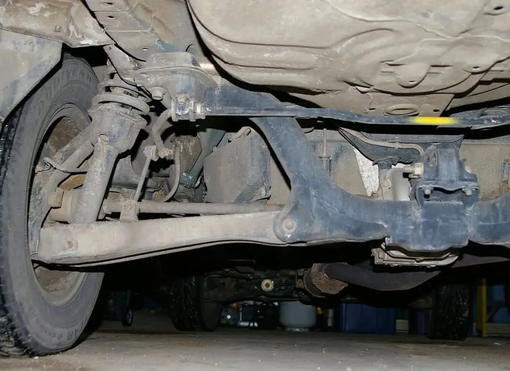 2. A multi link type rear independent suspension on an AWD car. The anti roll bar has some yellow paint on it