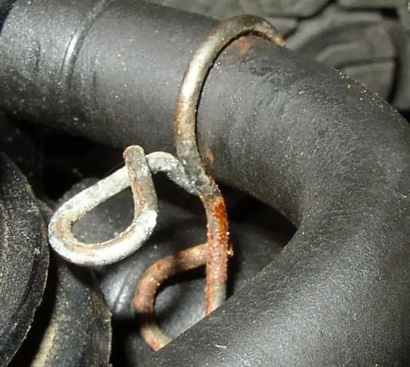 2. A spring clamp on an automotive radiator hose