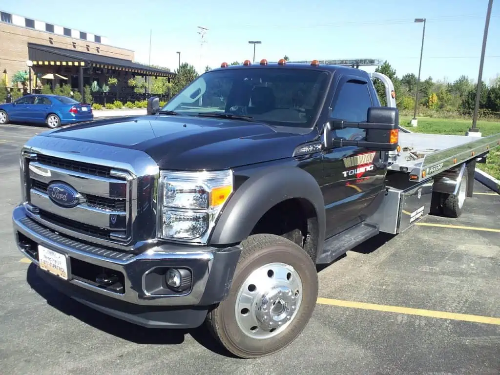 2. F 550 4x4 Single Cab Rollback Tow Truck