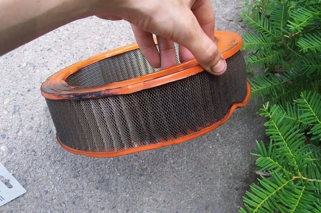 3. Auto engine air filter clogged with dust and grime
