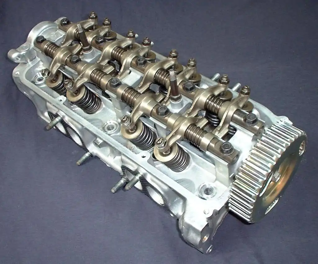 4. A cylinder head showing SOHC rocker arms valve springs and other components.