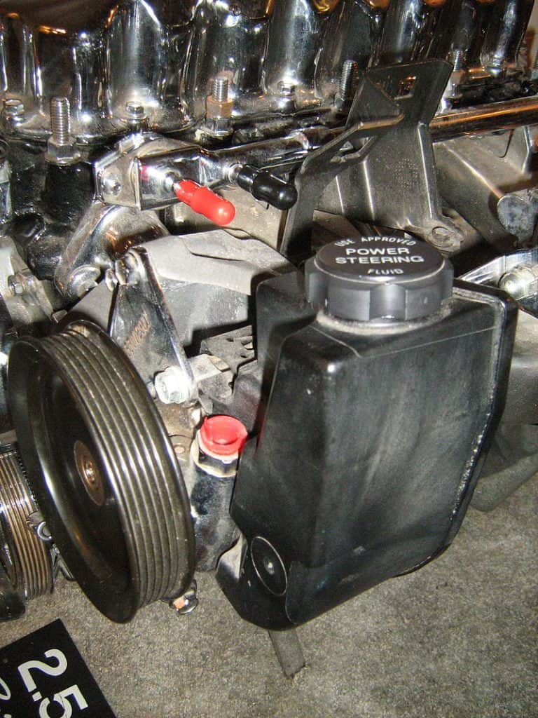 Steering Wheel Makes Noise When Turning - Causes and Fixes 4 4. A power steering fluid reservoir