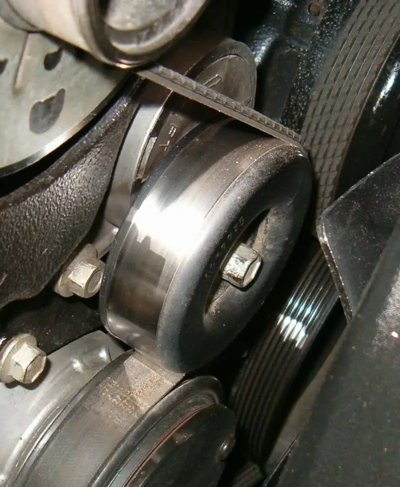 4. Belt tensioner and the timing belt