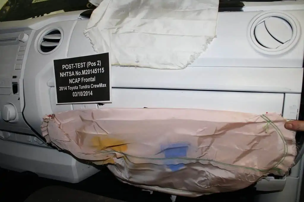 5. Deployed passenger knee airbag in a Toyota Tundra after a frontal collision test