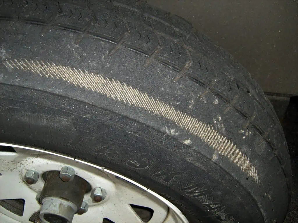 5. Tire showing uneven tread wear 1