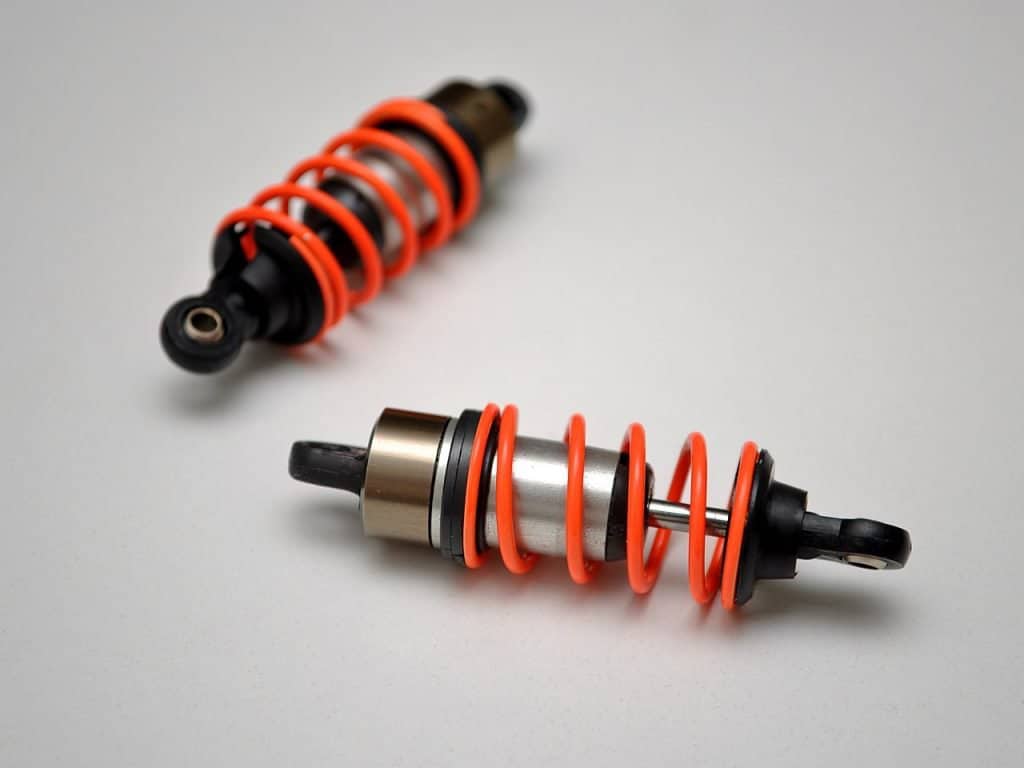 Steering Wheel Makes Noise When Turning - Causes and Fixes 6 6. A pair of automotive shocks