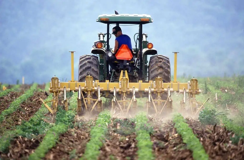 6. A tractor pulling a tiller