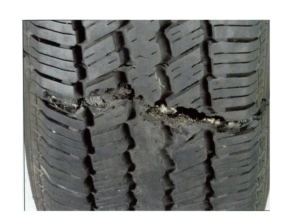 6. Automobile tire damaged after an impact